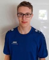 Ein Bild, das Person, Mann, Hemd, Brille enthält.
Automatisch generierte Beschreibung